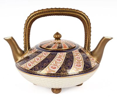 Royal Worcester Imari Porcelain Double Spout Teapot. Description: A footed Imari style porcelain 