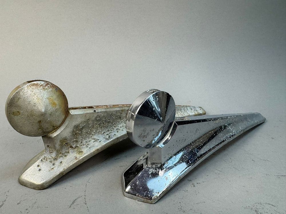 Lot 181: 2 Original 1949 Ford Mohawk Chrome Hood Ornaments