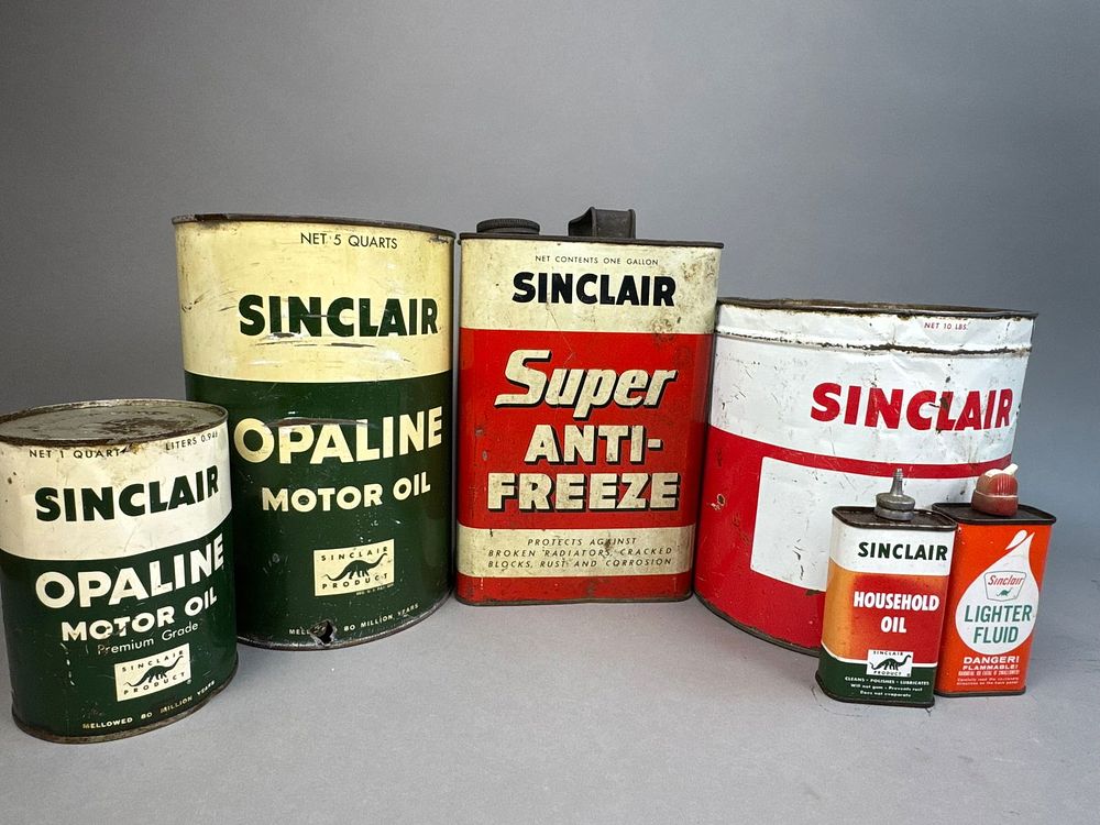 Lot 193: 6 Vintage Sinclair Opaline Dino Antifreeze Oil Cans