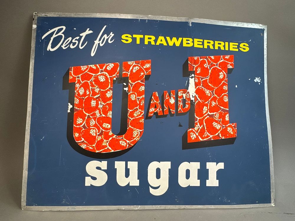 Lot 195: 50s Painted Metal U&I Sugar Strawberry Sign Store