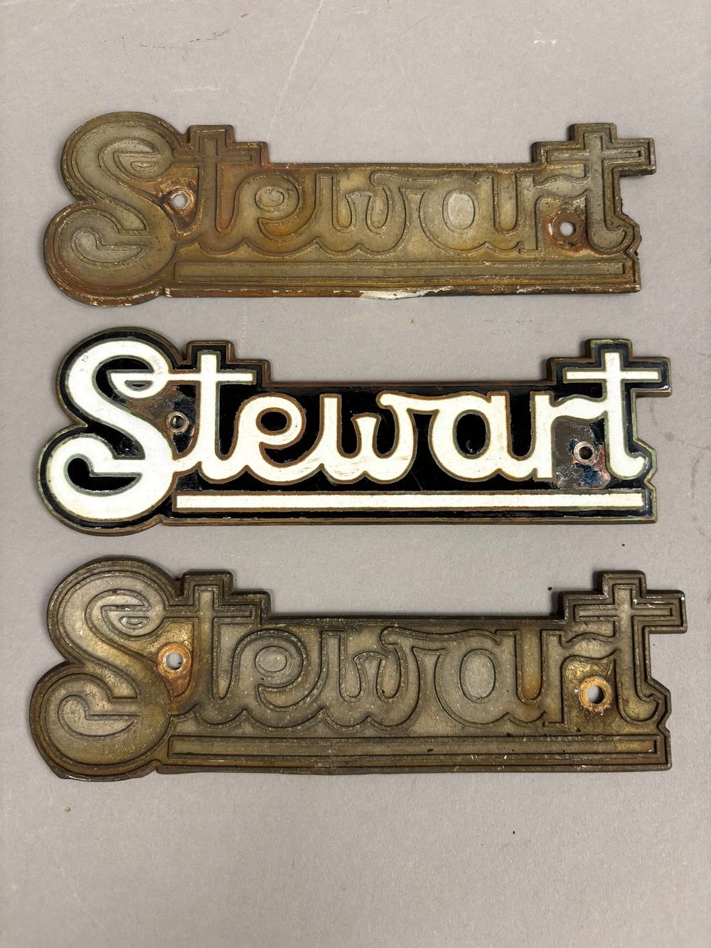 Lot 242: 3 Stewart Brass & Enamel Car Automotive Emblem