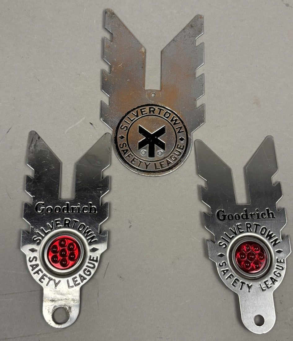 Lot 264: 3 Goodrich Silvertown Safety License Plate Topper