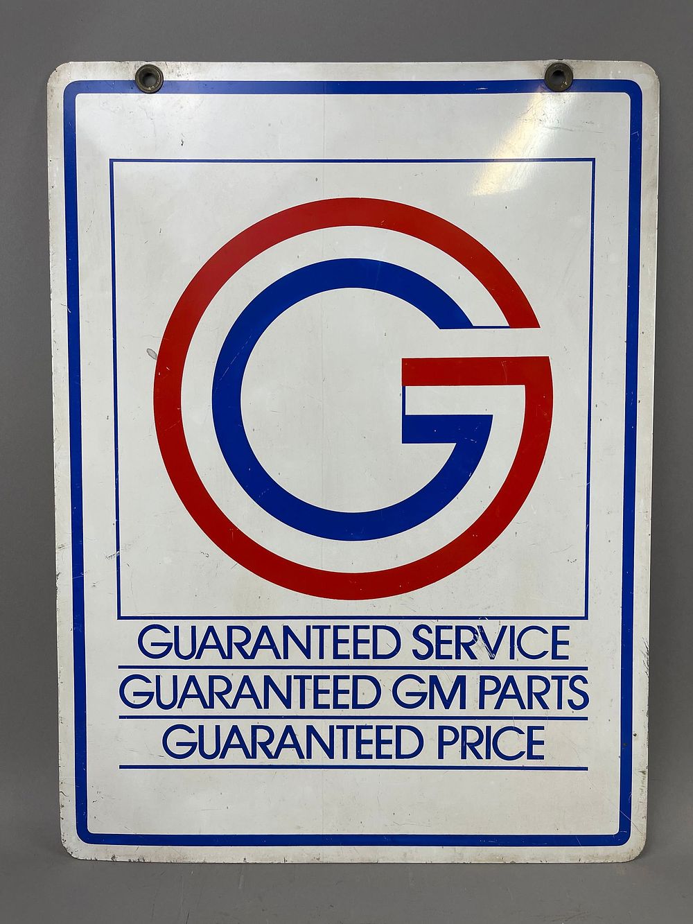 Lot 321: General Motors 70s DST Parts Original Hanging Sign