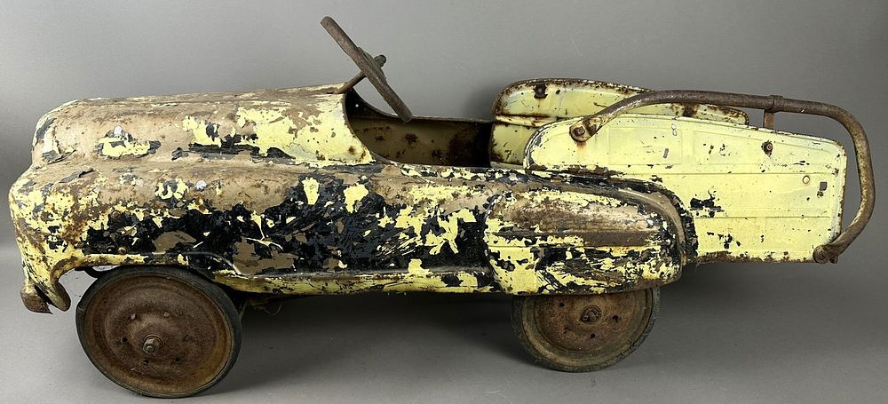 Lot 418: Original Sad Face 40s 50s Yellow Painted Pedal Car