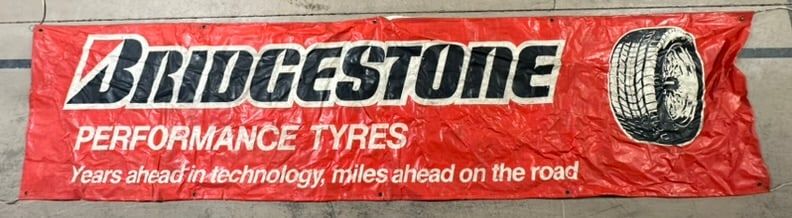 Lot 431: Bridgestone Perfance Tyres 12' Store Vinyl Banner Sign