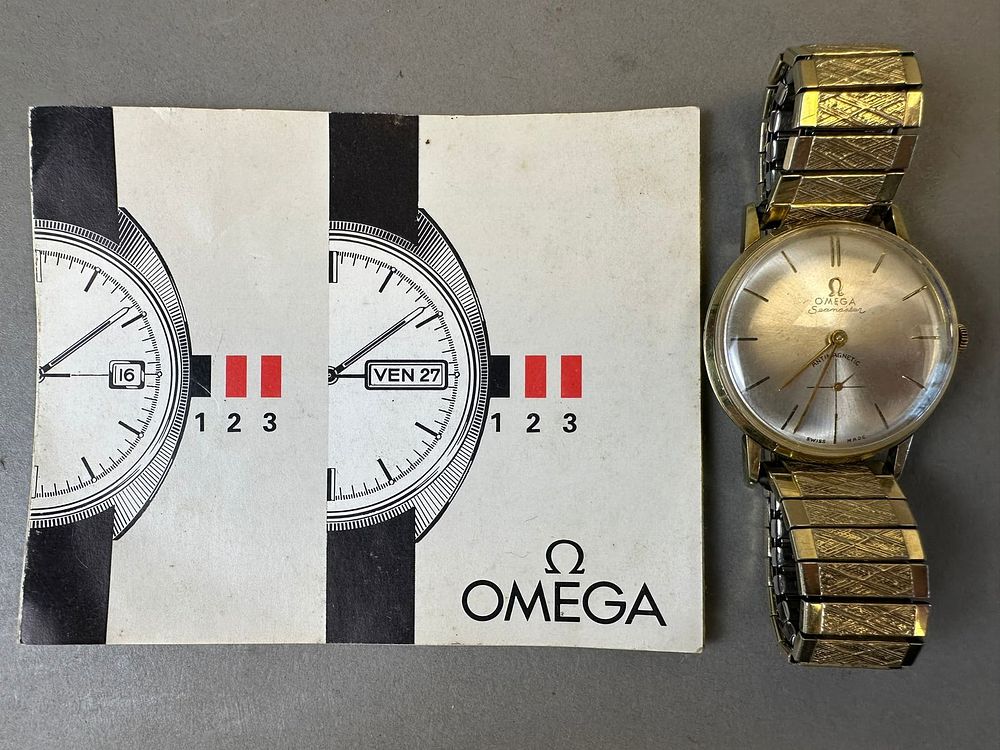 Lot 158: Vintage 18K Omega Seamaster Mens Wrist Watch Papers