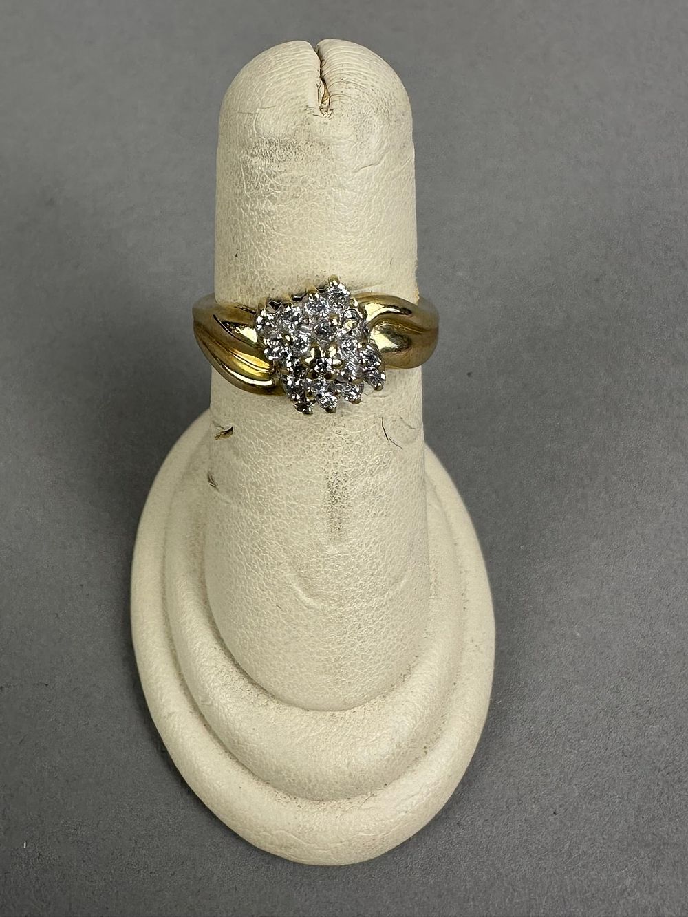 Lot 230: 10K Yellow Gold Ladies Diamond Cluster Ring 2.7 Grams