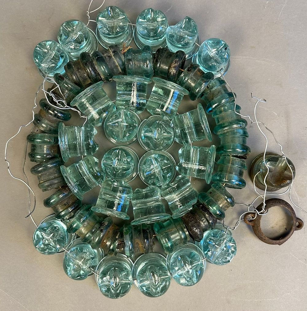 Lot 153: Huge Lot of 46 Early 1900s Cross Top Glass Insulators Green Blue Clear Glass Lightning Rod