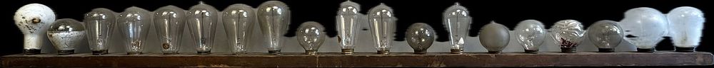 Lot 255B: 19 Piece Lightbulb Collection Display on Board Edison Figural Bulbs