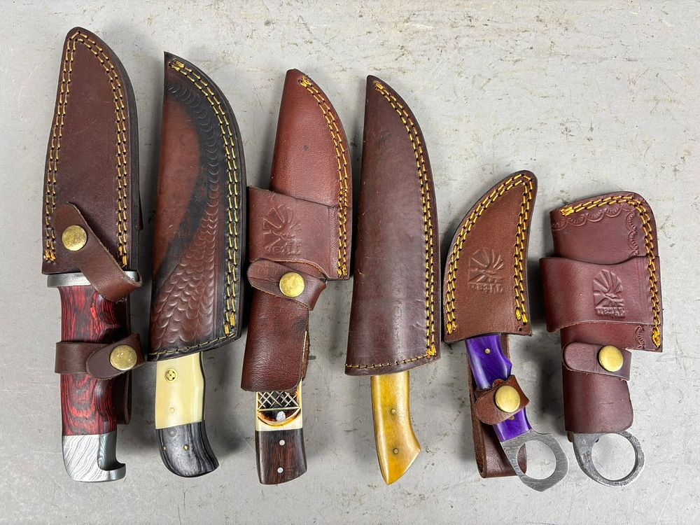 Lot 155: 6 Vintage Damascus Blade Hunting Knives Seaths