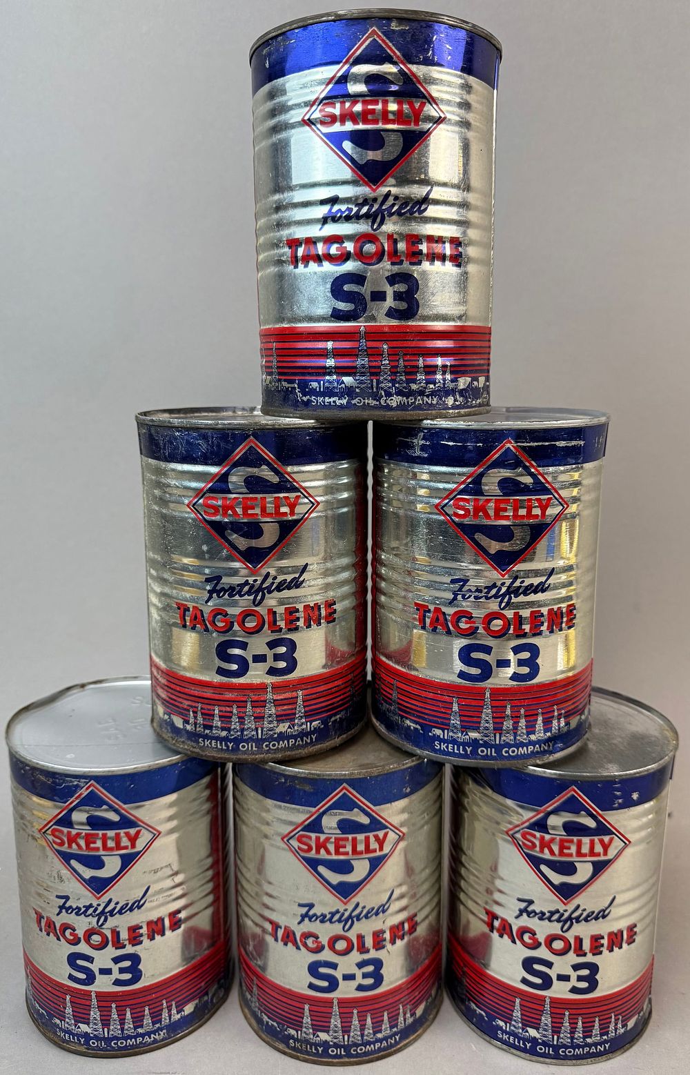 Lot 145: 6 NOS Skelly Tagolene S-3 Rippled Quart Metal Cans