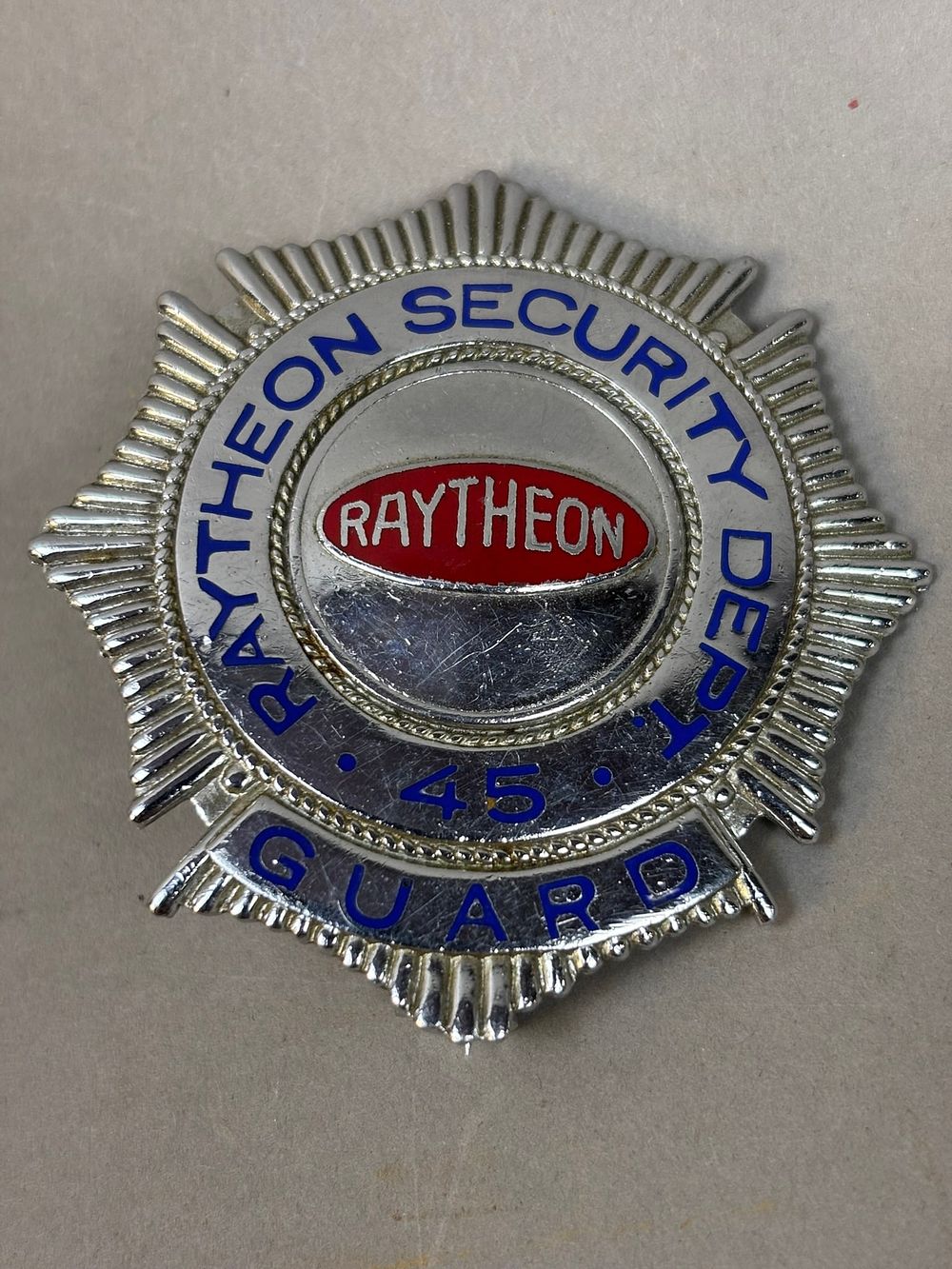 Lot 164: Vintage Raytheon Security Department Guard Badge