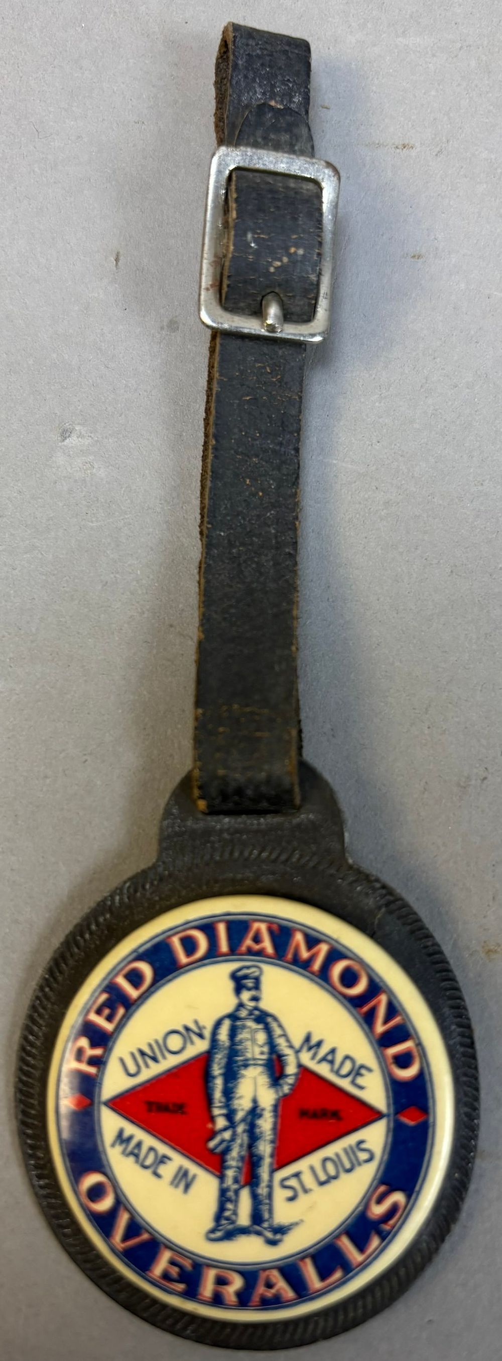 Lot 165: Early Red Diamond Overall Cellouloid Watch Fob