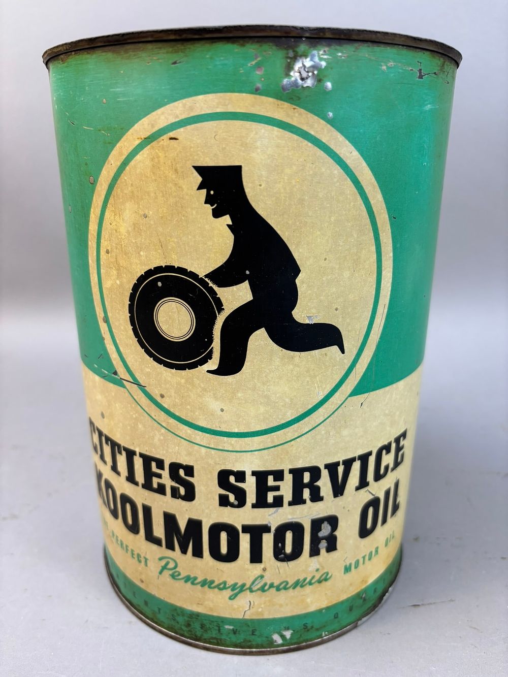 Lot 182: Cities Service Koolmotor Oil 5 Quart Man Tire Can