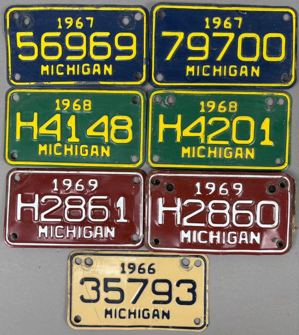 Lot 357: 7 Original 60s Michigan Motorcycle License Plates