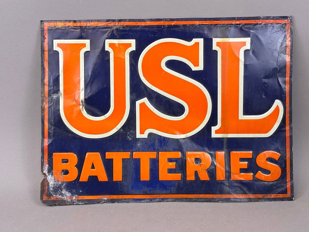 Lot 380C: USL Batteries Embossed SST Advertising Sign