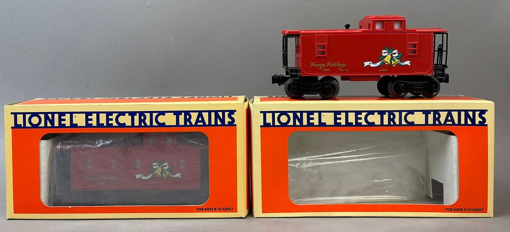 Lot 264: 2 NOS Lionel Happy Holidays Square Window Caboose