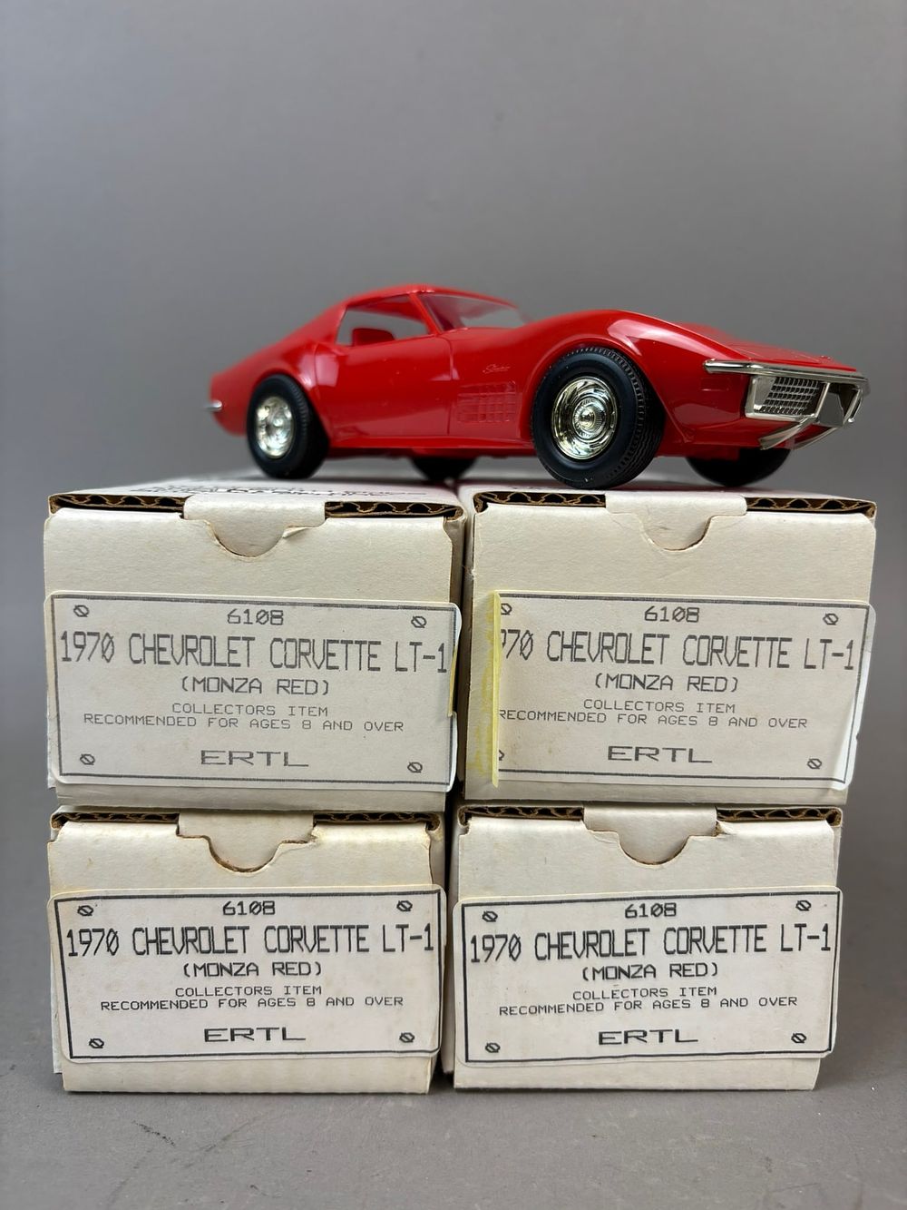 Lot 302: 4 NOS Ertl 70 Chev Corvette LT1 Reissue Promo Cars Red