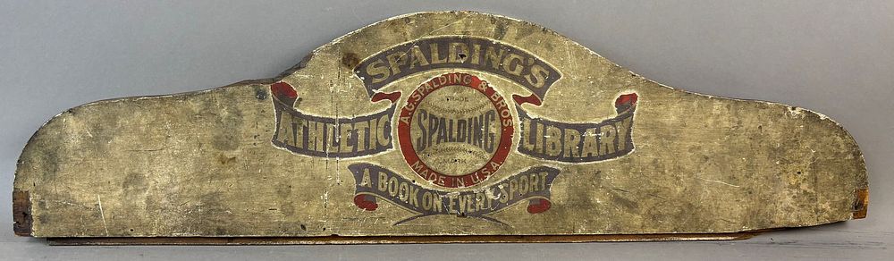 Lot 306: A.G. Spalding & Bros Spalding's Athletic Library Early 20th Century Wooden Advertising Sign
