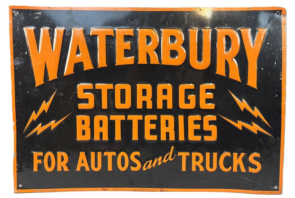 Lot 123: Waterbury Storage Batteries Autos & Trucks SST Embossed Sign