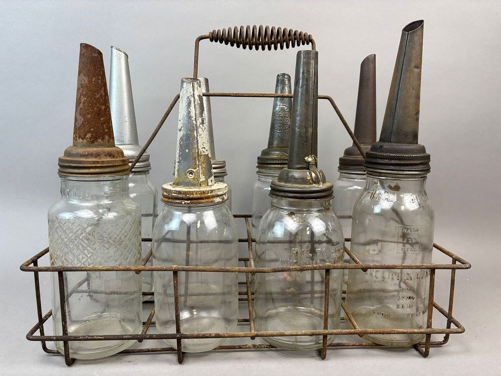 Lot 215: Lot 8 Original Quart Glass Oil Bottles w/ Carrier Masters & Mass Embossed
