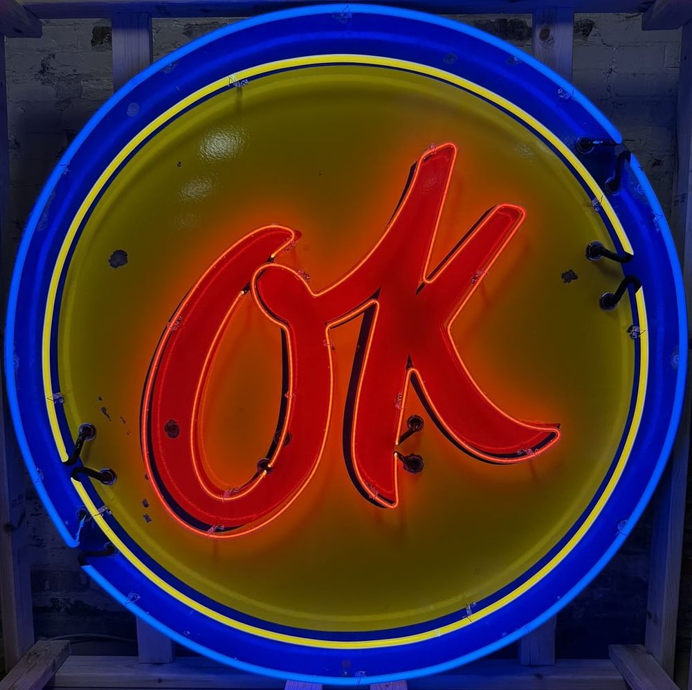 Lot 253: OK Chevy Used Cars 5' Neon SSP Porcelain Dealership Sign