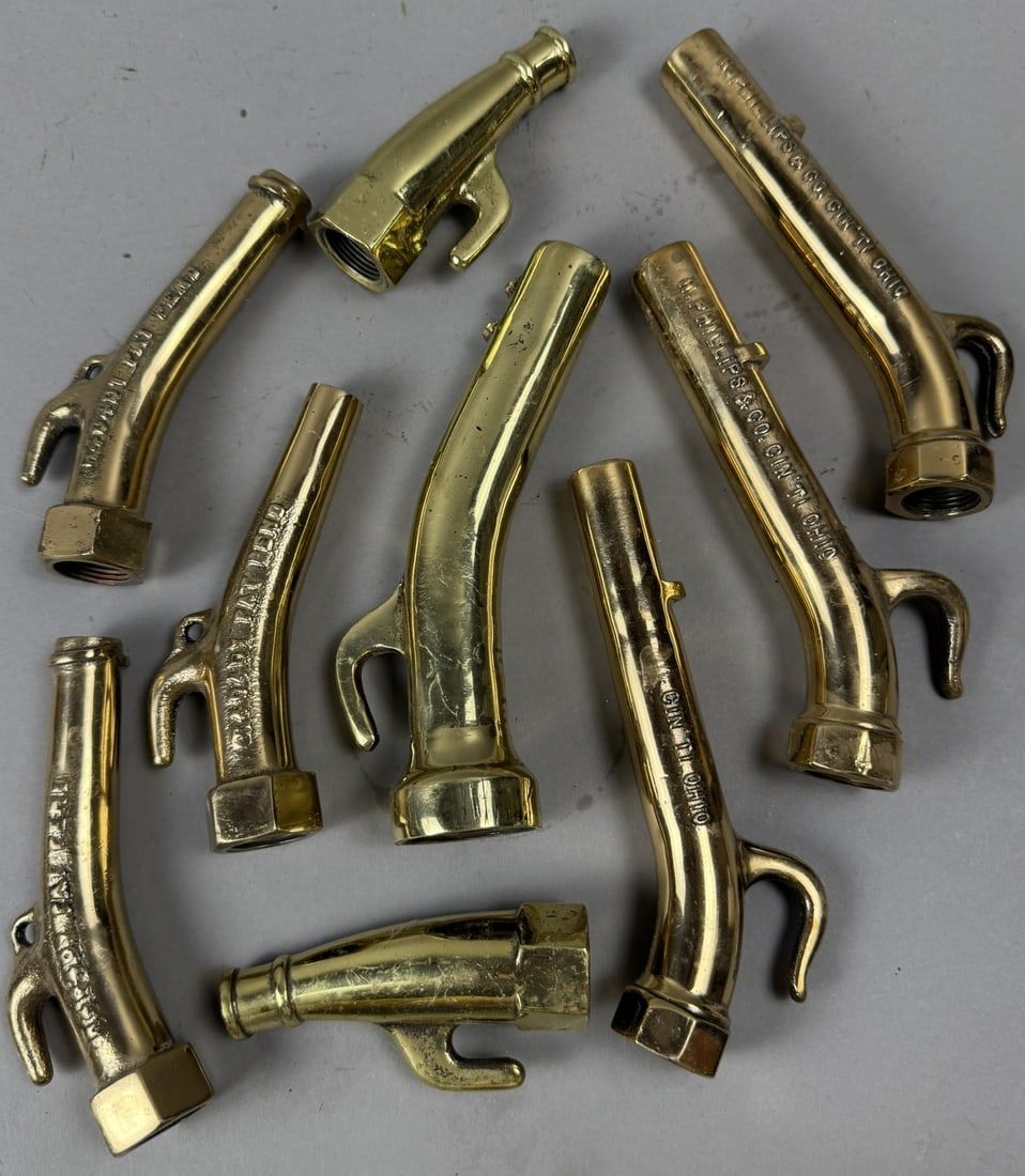 Lot 395: 9 Antique Solid Brass Polished Varying Gas Pump Nozzles
