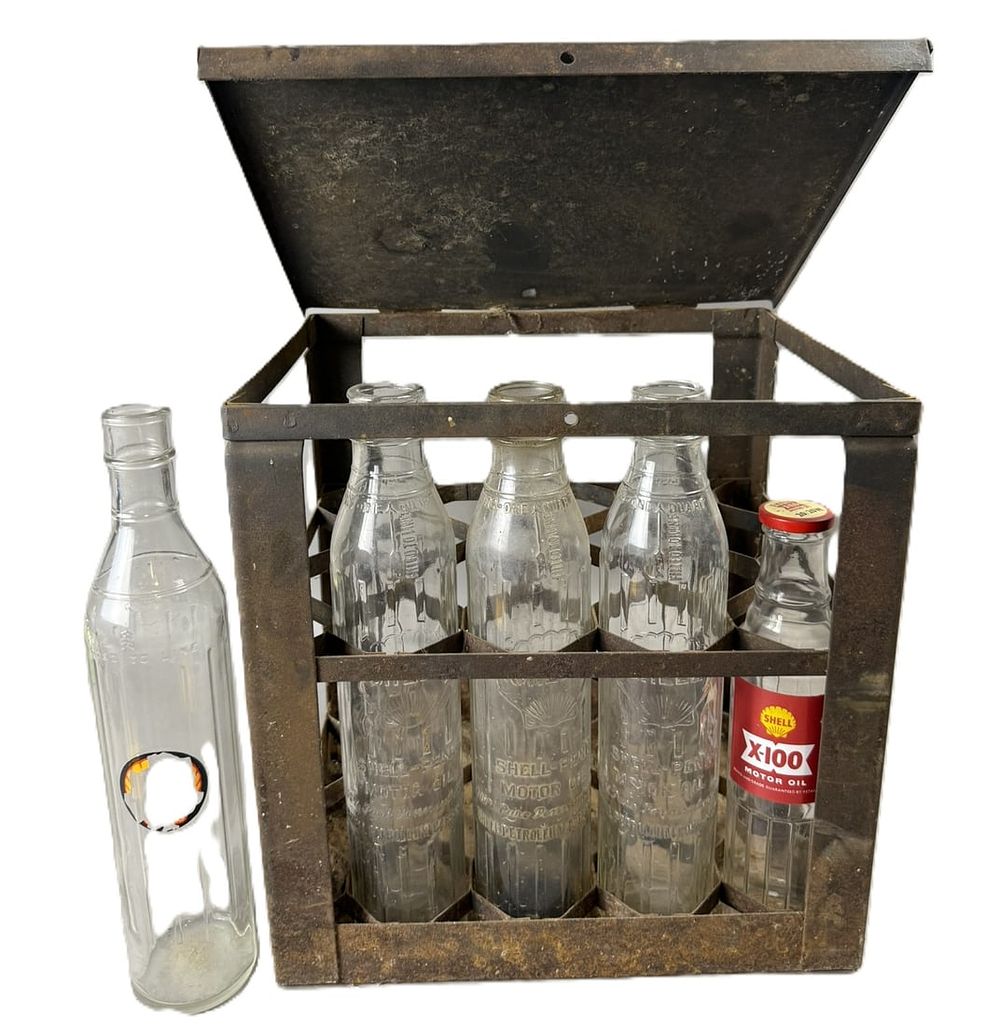 Lot 404: Original Shell Embossed 1920s Bottles & Metal Carrier