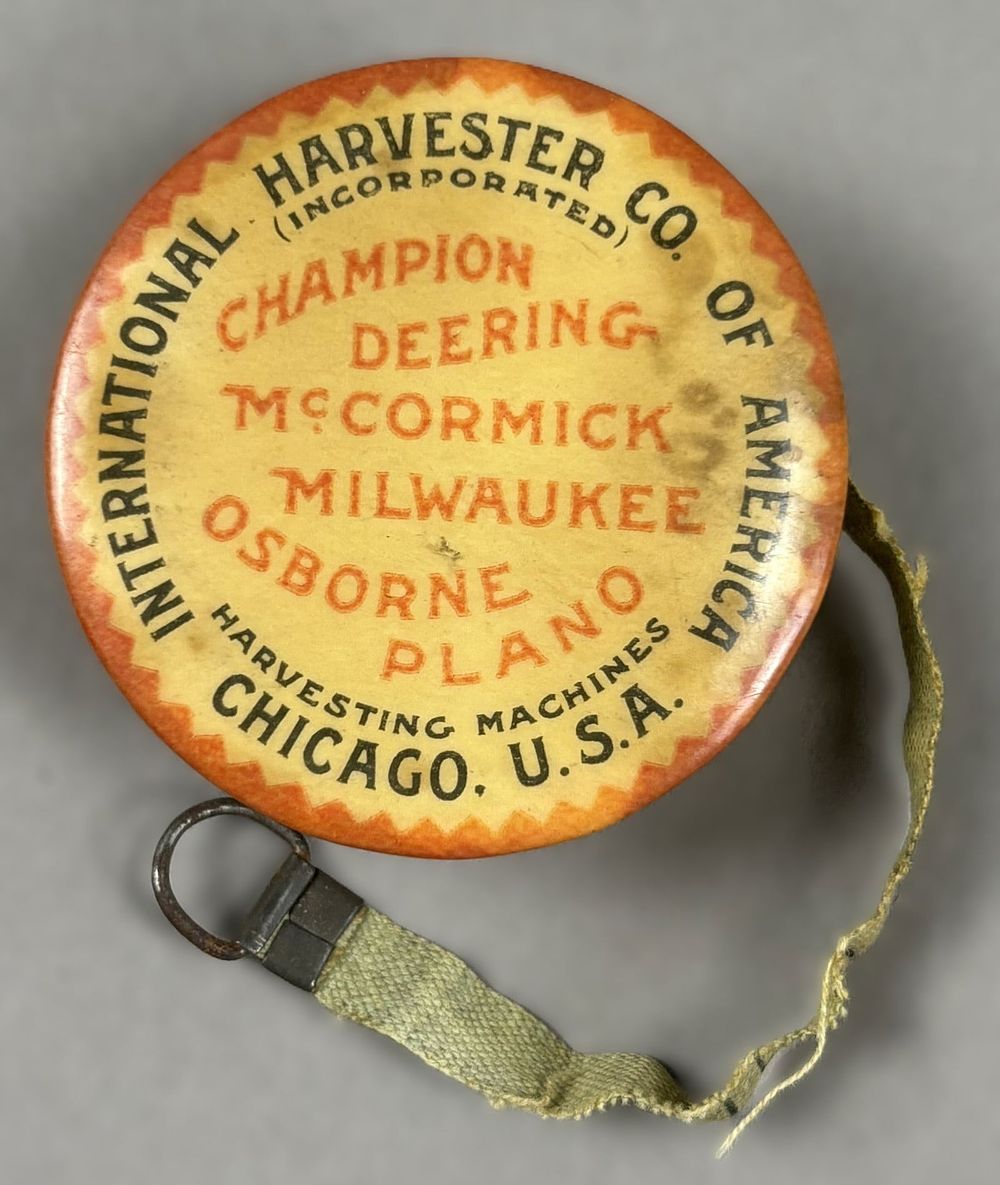 Lot 159: International Harvester Co Champion Deering McCormick Cloth Celluloid Tape Measure