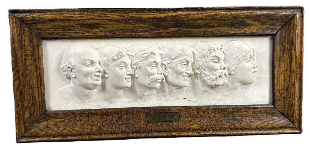 Lot 181: A Good Joke Victorian Man & Woman Figural Plaster Head Relief Wall Plaque
