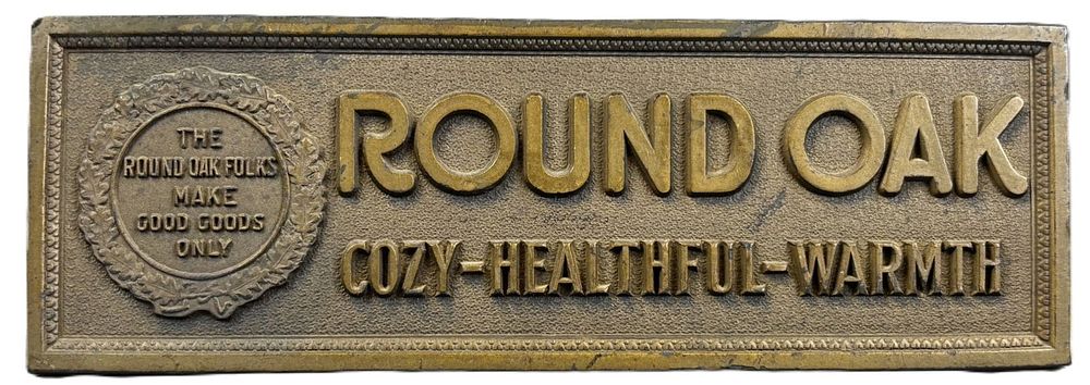 Lot 260: Round Oak Stoves Cozy Healthful Warmth Embossed Fiber Advertising Sign
