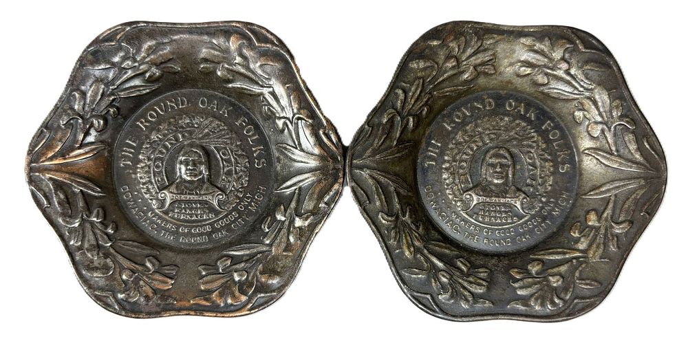 Lot 280: Pair 3.5" Round Oak Stoves Dowagiac Michigan Native American Advertising Ashtrays
