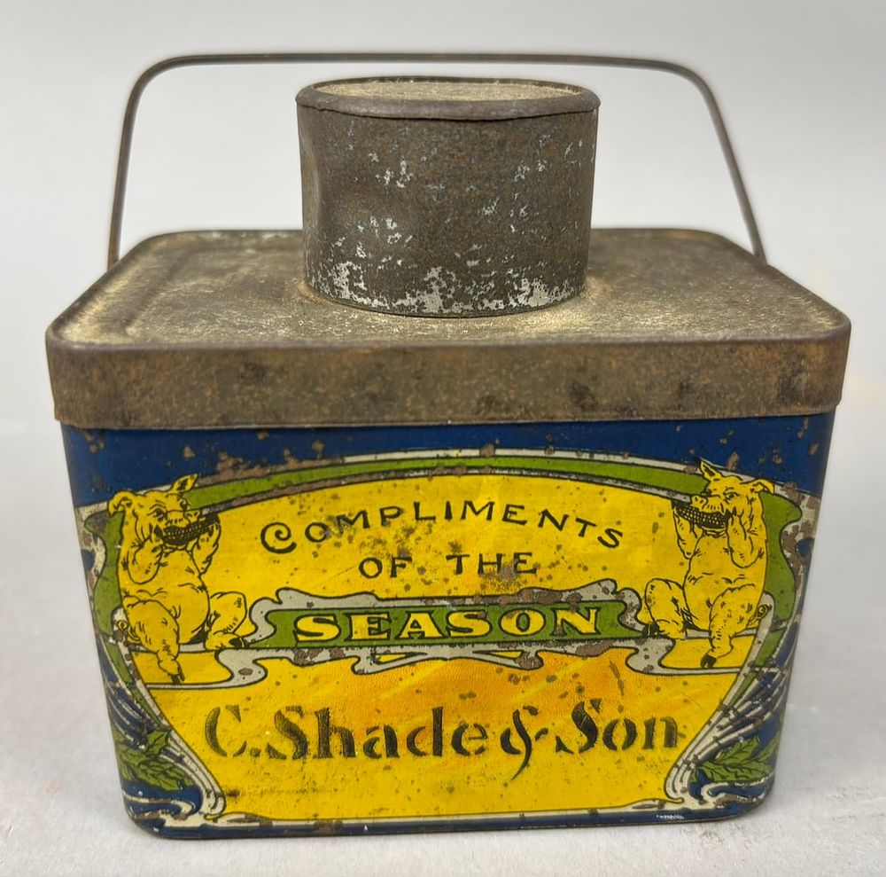 Lot 324: Pat'd 1887 Compliments Of The Season C. Shade & Son Tin Can w/ Pig Graphics