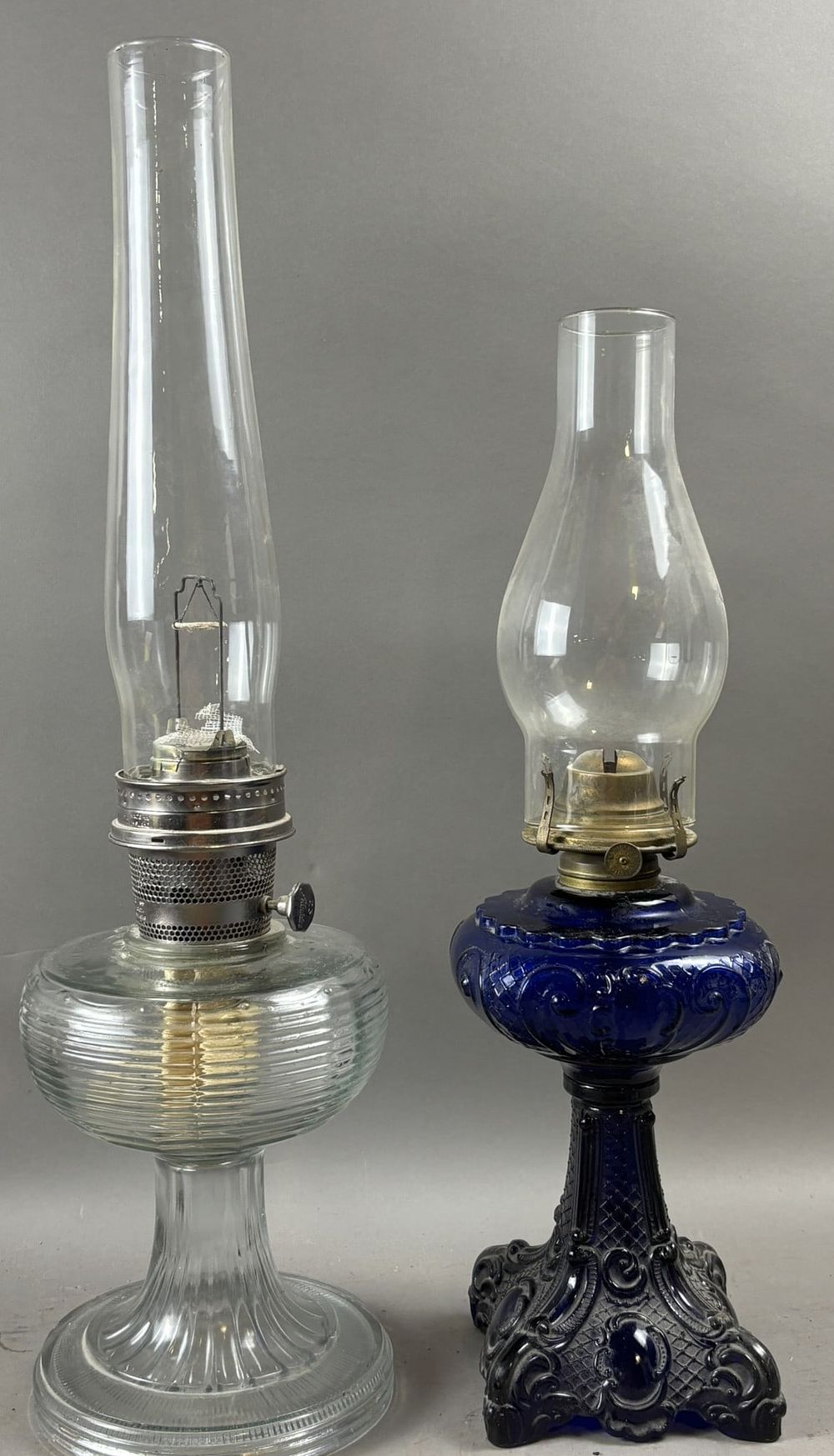 Lot 379: Pair Antique Blue Cobalt Banner Glass & Aladdin No 23 Oil Lamps