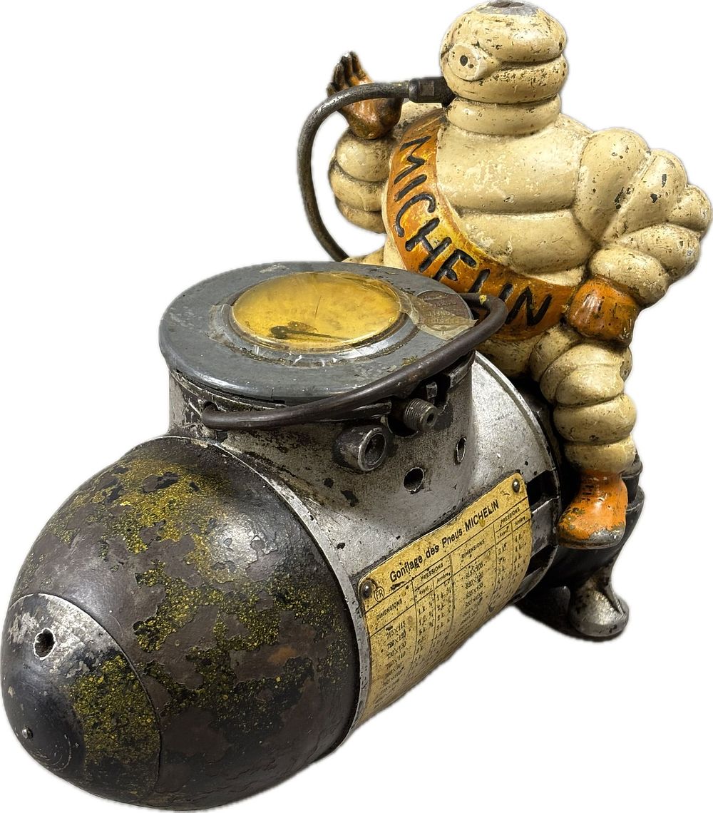 Lot 100B: Antique Original Michelin Man Bibendum Cast Iron Air Compressor