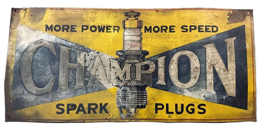 Lot 324A: Champion More Speed More Power SST Tin Embossed Spark Plug Sign