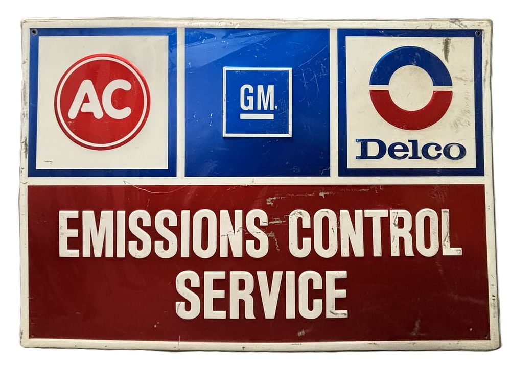 Lot 325A: AC Delco General Motors Emissions Embossed Tin Advertising Sign