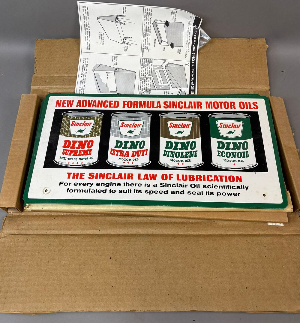 Lot 183: Dino Law Of Lubrication NOS Double Sided Metal Advertising Sign w/ Box