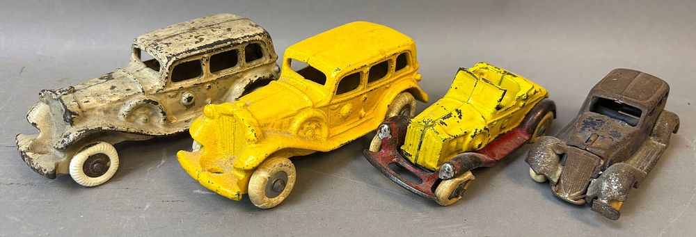 Lot 237B: Antique Lot 4 Original Cast Iron Touring Sedan Toy Cars