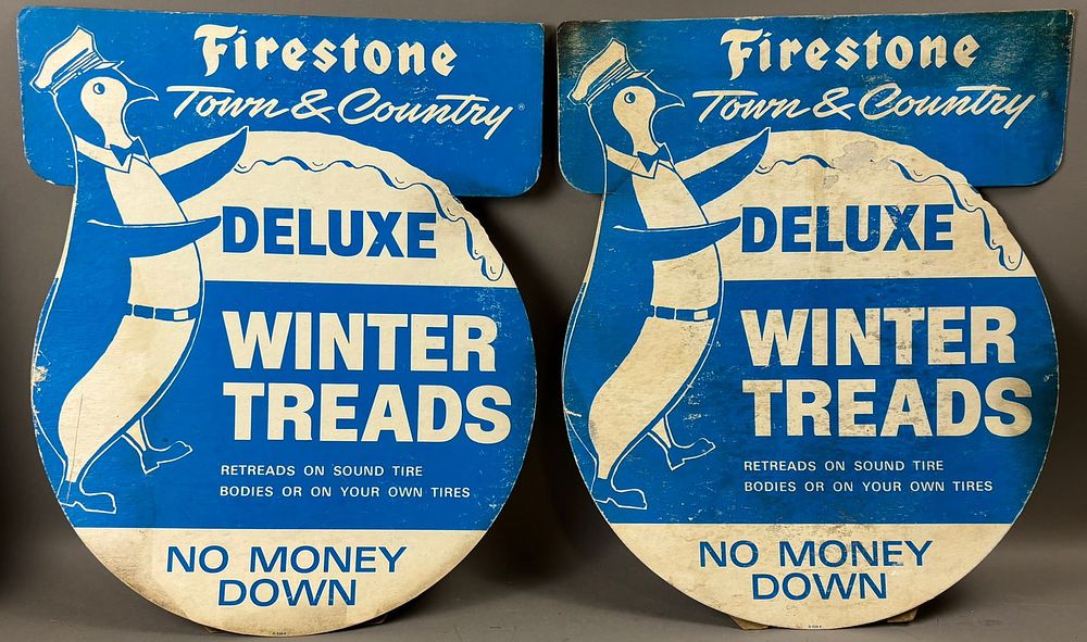 Lot 284: Pair Firestone Delux Winter Treads Cardboard Easelback Signs w/ Penguins