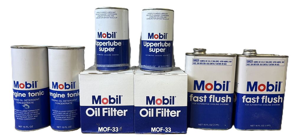 Lot 489: Lot 8 Mobil Gas Station NOS Full Cans Upperlube Engine Tonic & Fast Flush