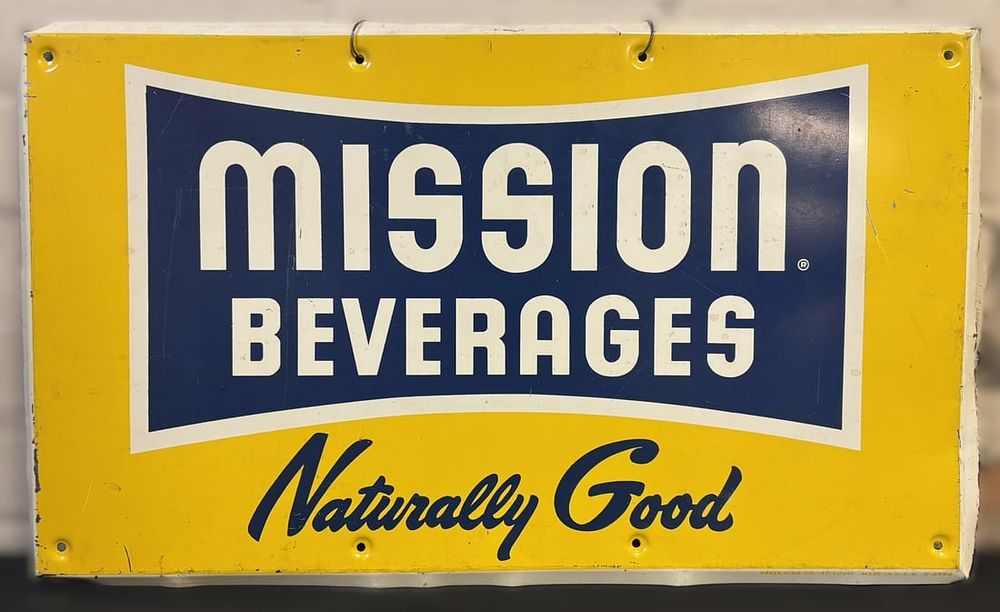 Lot 544: Mission Beverages Naturally Good SST Painted Metal Sign