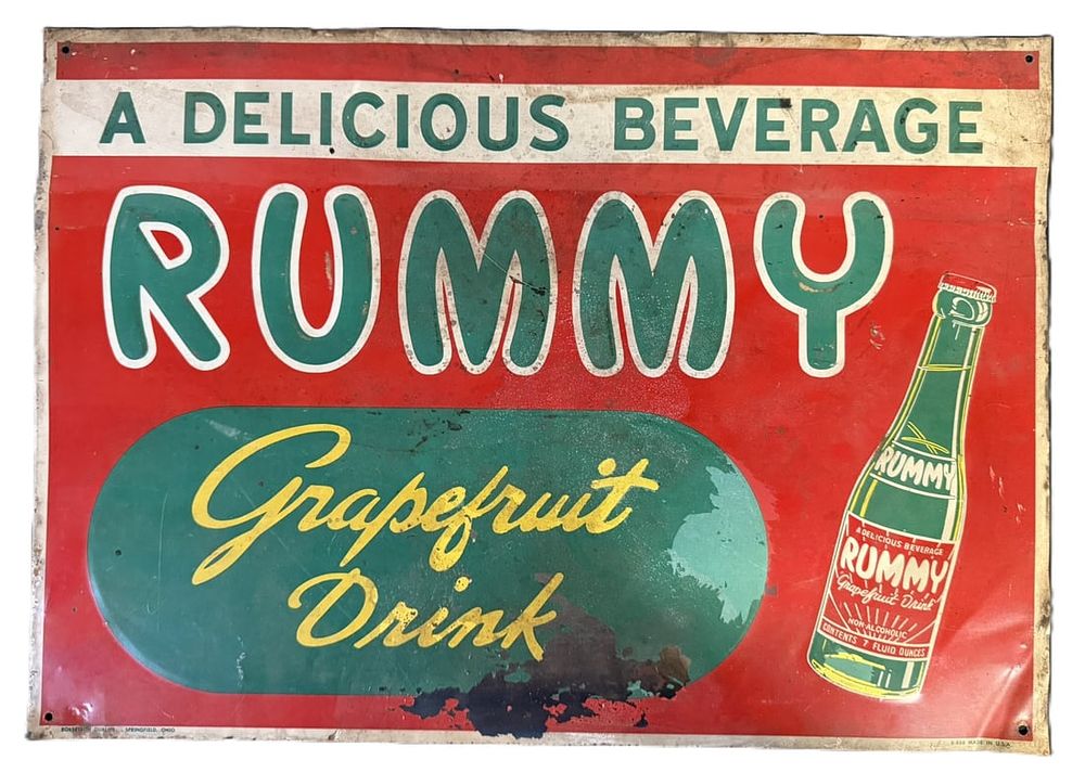 Lot 571: Rummy Grapefruit Drink Original SST Tin Litho Embossed Sign