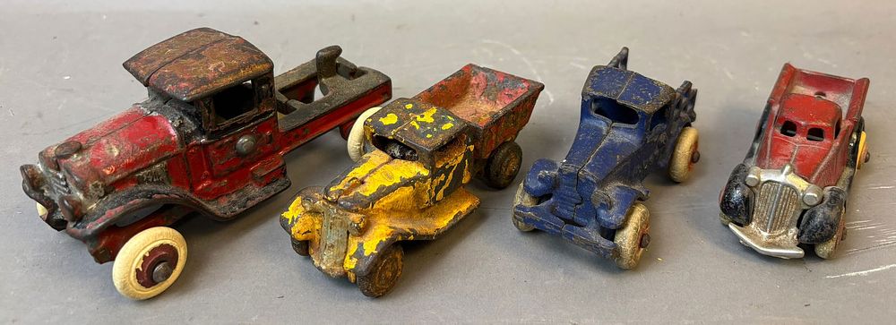Lot 237C: Antique Lot 4 Original Cast Iron Dump Trucks & Parts