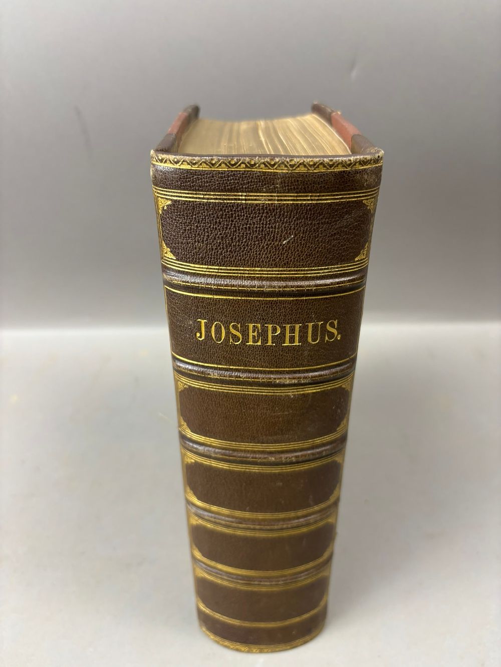 Lot 161: Antique Leather Bound “Works of Flavius Josephus” Book w/ Engravings