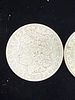 Two 1900 Morgan Silver Dollars Circulated Pair. Lot of two United States Morgan silver dollars Image - 1