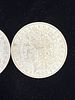 Two 1900 Morgan Silver Dollars Circulated Pair. Lot of two United States Morgan silver dollars Image - 2