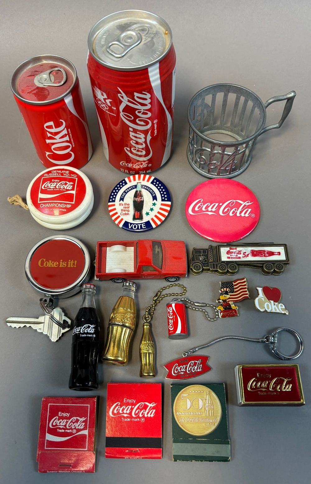 Lot 153: Lot 20 Vintage Coca Cola Advertising YoYo Pinback Keychains Matchbooks