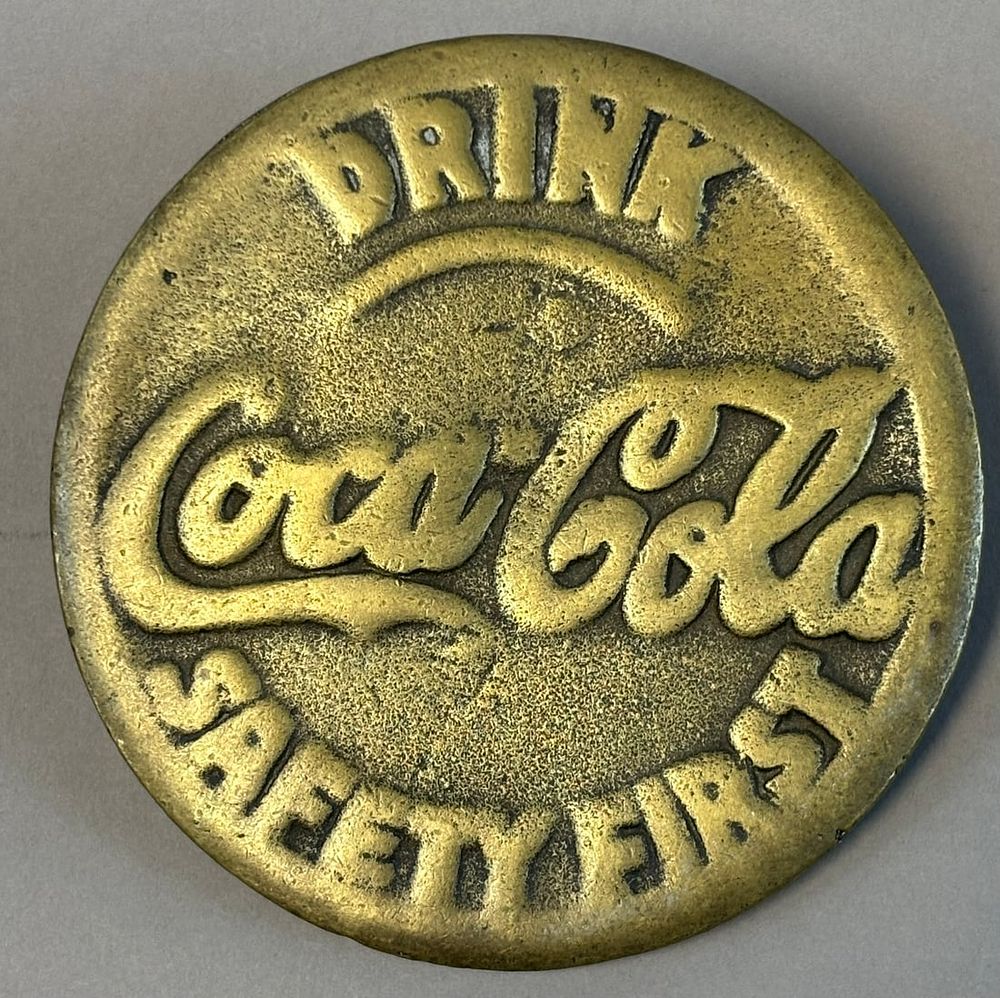 Lot 173: Antique Drink Coca Cola Safety First 4" Brass Sidewalk Markers