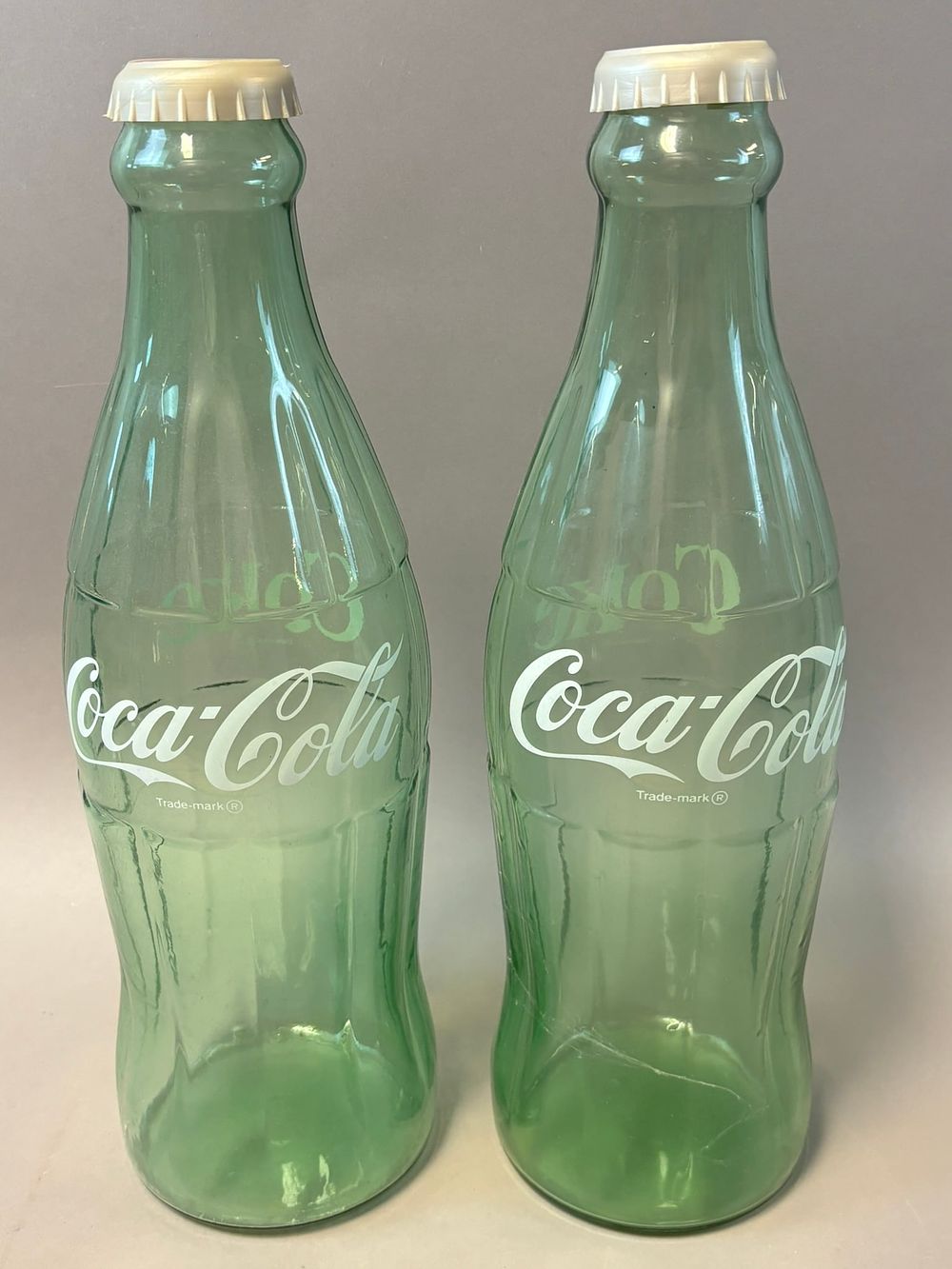 Lot 248: Pair 20" Original Coca Cola Glass Advertising Coin Bank Store Display Bottles
